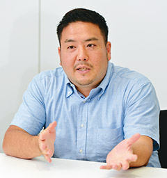 流通・金融ソリューション事業部 商品戦略部 商品戦略第二担当 主任 吉岡 寿朗